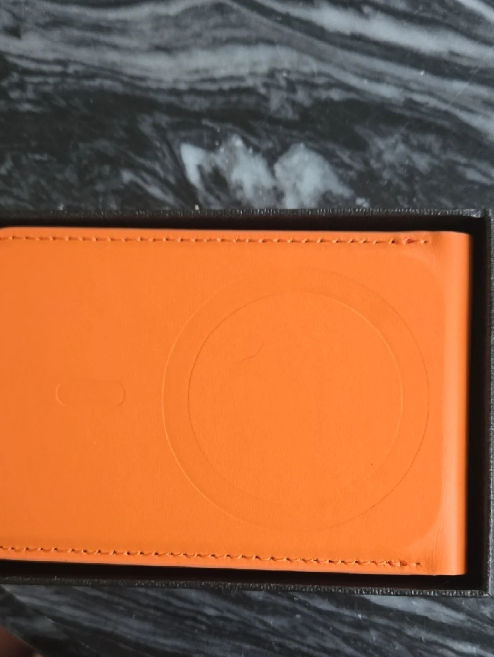 Orange Leather Card Holder with Elastic Strap.